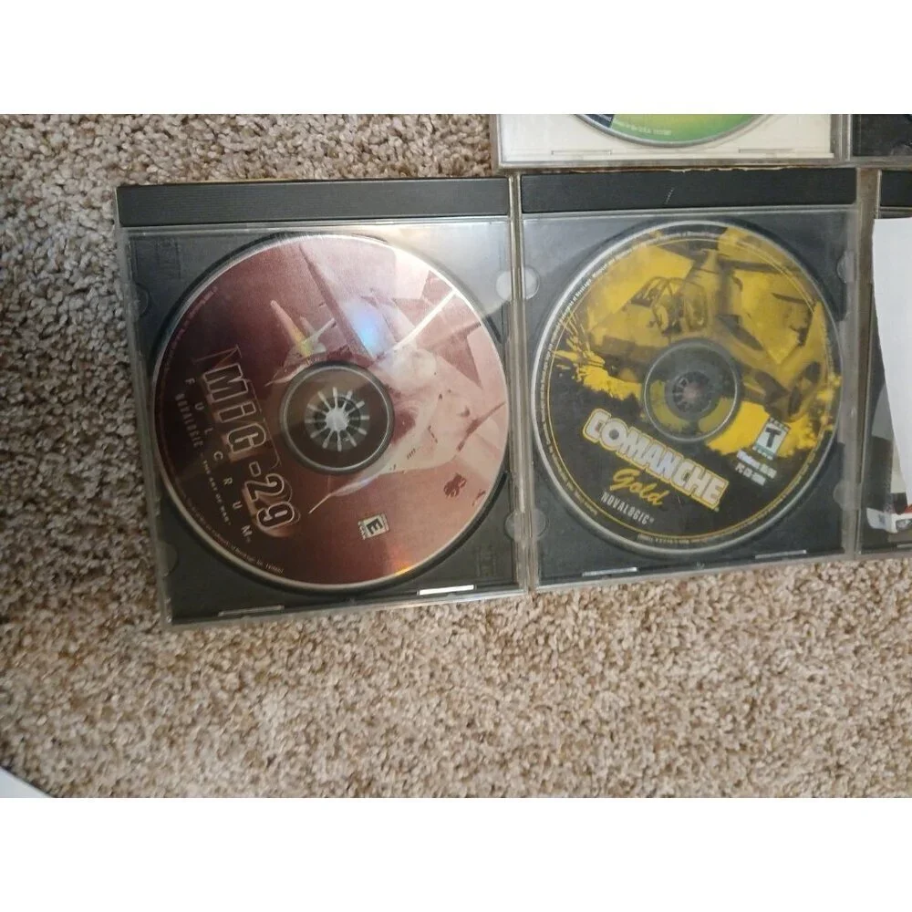 Lot of 5 PC Computer Games NASCAR, NUCLEAR STRIKE MIG 29..